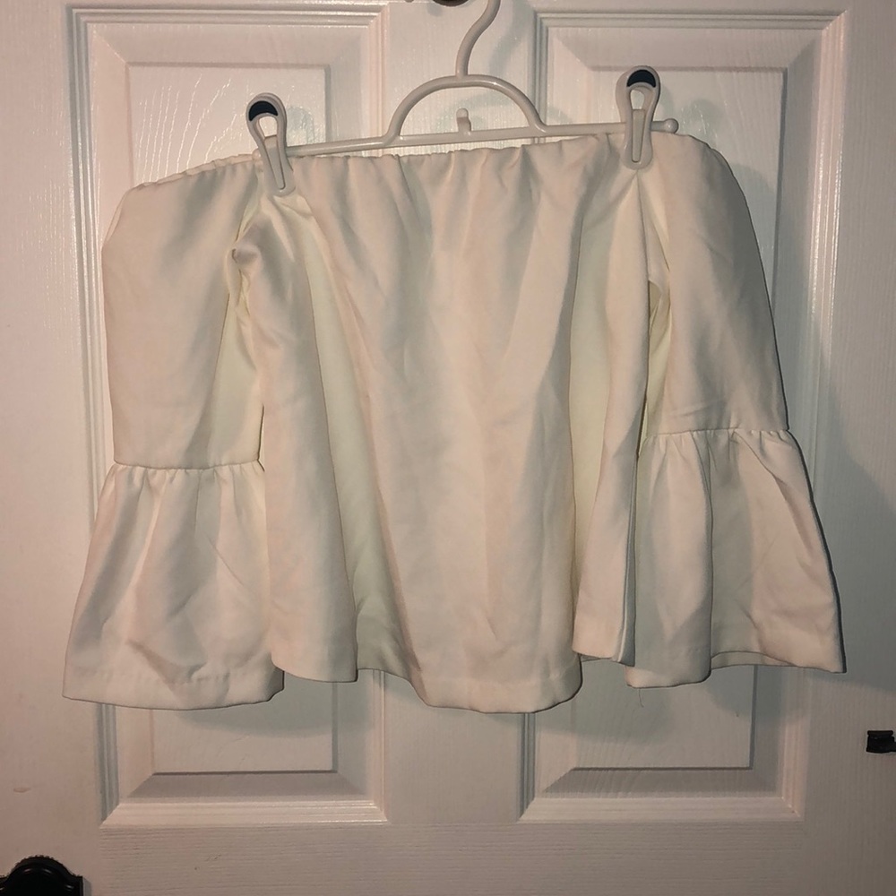Cream off the shoulder flare sleeve top